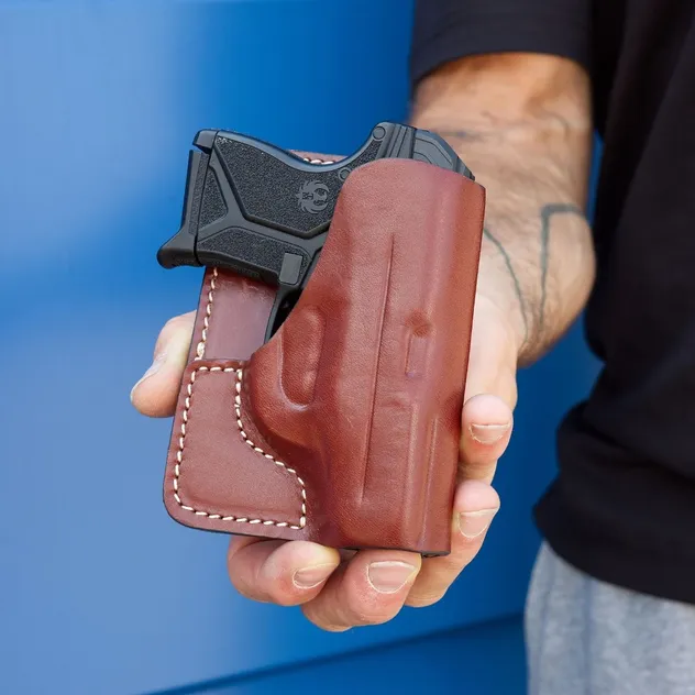 Looks like just a wallet in your pocket. Only you know you’re fully prepared. The A226 Leather wallet holster for pocket carry.