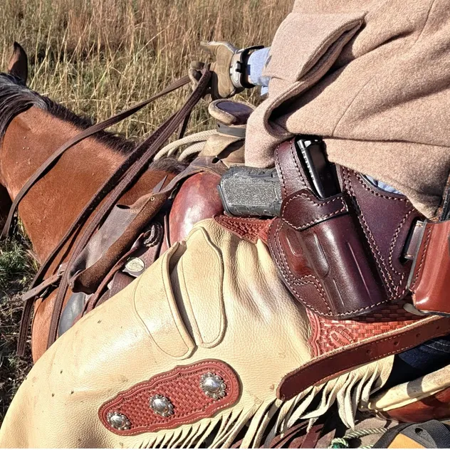 Four legs or four wheels? 🐎🚗 Comfortable carry and easy access matter either way. The FALCO C634 Clymer Cross-Draw Leather Holster is built for both.