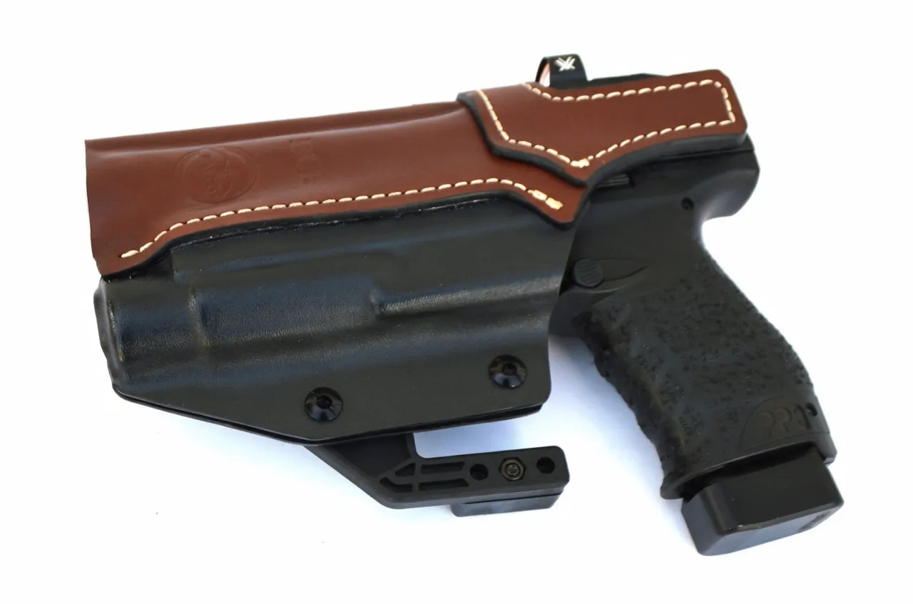 Note the Falco foot attachment for use when the holster is worn in the appendix position. This prevents roll out