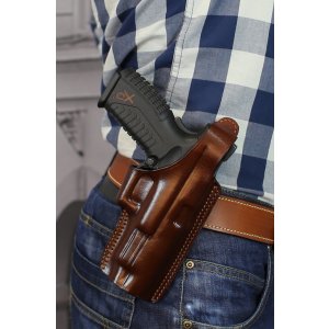Slim design OWB leather holster with thumb break and belt clip