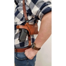 Horizontal leather shoulder holster with a double mag pouch for gun with light