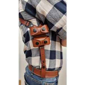 Vertical leather shoulder holster with a harness and double speedloader pouch